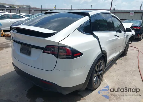 2023 Tesla Model X Dual Motor All-Wheel Drive/Standard Range from USA, damaged, VIN 7SAXCBE57PF421329